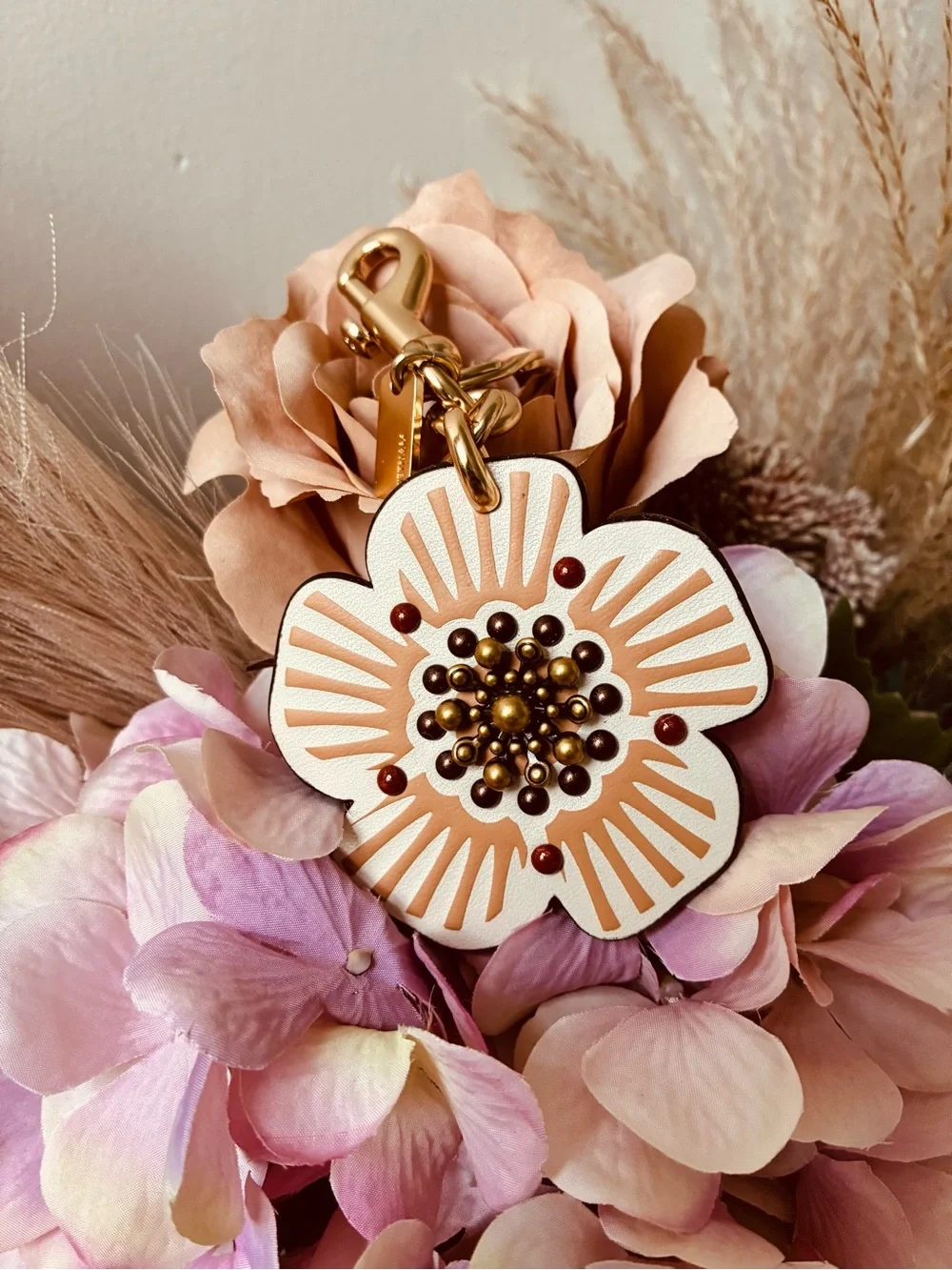 Coach tea rose